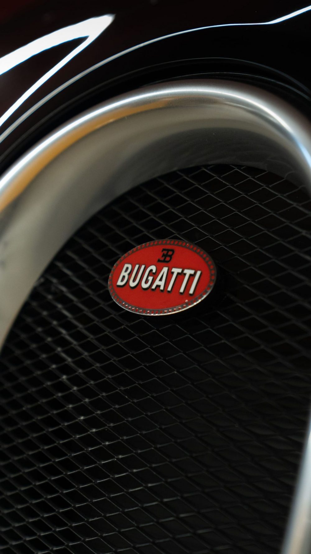 RR Motors Candy Shop Autohaus 8 Bugatti Emblem von einem Veyron.